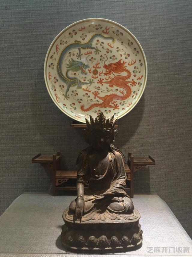 我对“清华珍品”款粉彩双龙戏珠盘的研究